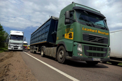 Trucks with grain wait for crossing the Ukraine-Moldova border in Odesa region, as Russia's attack on Ukraine continues, Ukraine June 11, 2022.  