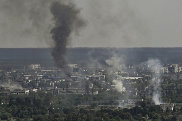 Smoke and dirt rise from the city of Severodonetsk during fighting between Ukrainian and Russian troops in the eastern Ukrainian region of Donbas