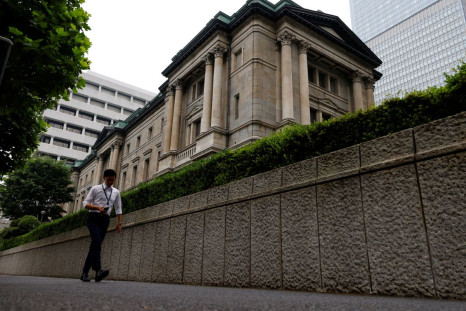 A man walks past Bank of Japan's headquarters in Tokyo, Japan, June 17, 2022. 