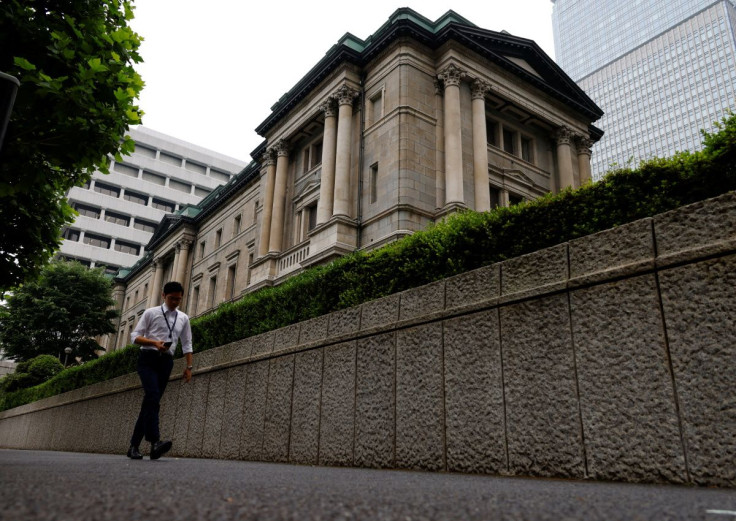 A man walks past Bank of Japan's headquarters in Tokyo, Japan, June 17, 2022. 