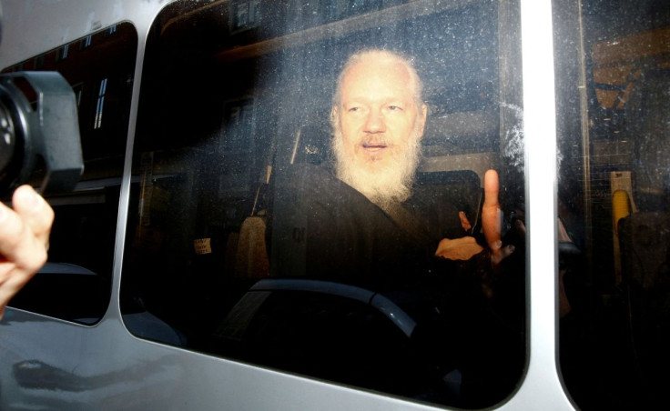 WikiLeaks founder Julian Assange is seen in a police van, after he was arrested by British police, in London, Britain April 11, 2019. 