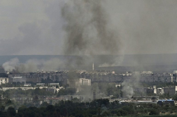 Smoke and dirt rise from the industiral city of Severodonetsk on Friday, where fighting has raged for weeks
