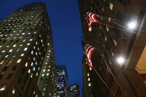 Flags fly outside 85 Broad St., the Goldman Sachs headquarters in New York's financial district, January 20, 2010.     