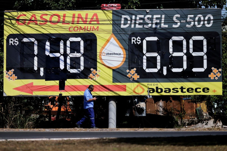 Gasoline and diesel price are displayed near a gas station following the announcement of updated fuel prices at at the Brazilian oil company Petrobras in Brasilia, Brazil June 17, 2022.