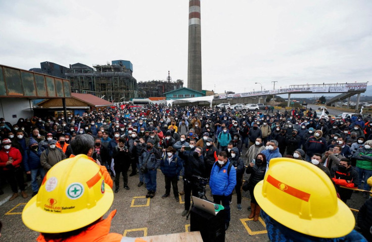 Workers of Codelco's Ventanas copper smelter take part in a rally in support of their job positions, after authorities declared an environmental emergency in the region, pointing to the refinery as a possible cause of contamination along with other compan