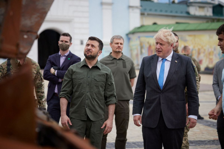 British Prime Minister Boris Johnson and Ukraine's President Volodymyr Zelenskiy visit an exhibition of destroyed Russian military vehicles and weapons, as Russia's attack on Ukraine continues, at Mykhailivska Square in Kyiv, Ukraine June 17, 2022. Ukrain