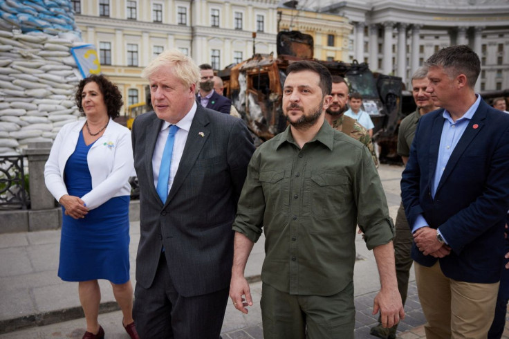 British Prime Minister Boris Johnson and Ukraine's President Volodymyr Zelenskiy walk at Mykhailivska Square, as Russia's attack on Ukraine continues, in Kyiv, Ukraine June 17, 2022. Ukrainian Presidential Press Service/Handout via REUTERS