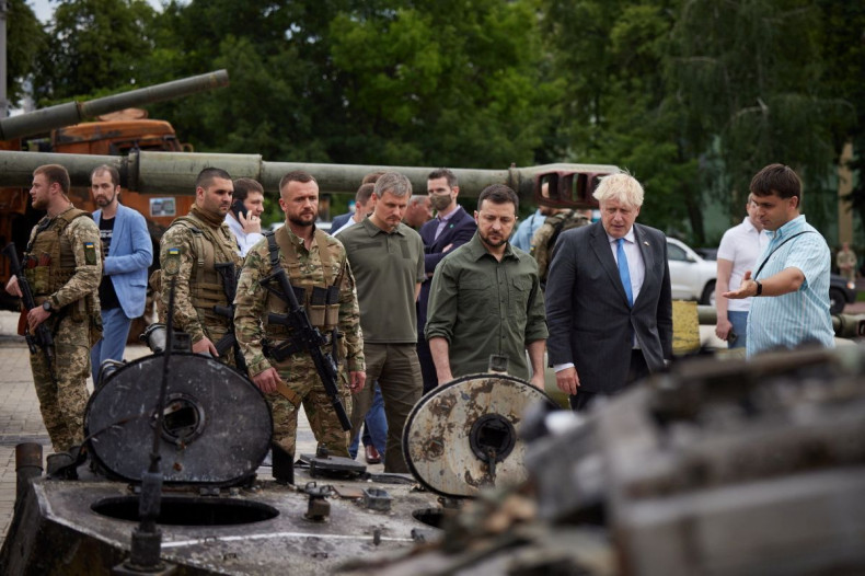 British Prime Minister Boris Johnson and Ukraine's President Volodymyr Zelenskiy visit an exhibition of destroyed Russian military vehicles and weaponry, as Russia's attack on Ukraine continues, at Mykhailivska Square in Kyiv, Ukraine June 17, 2022. Ukrai
