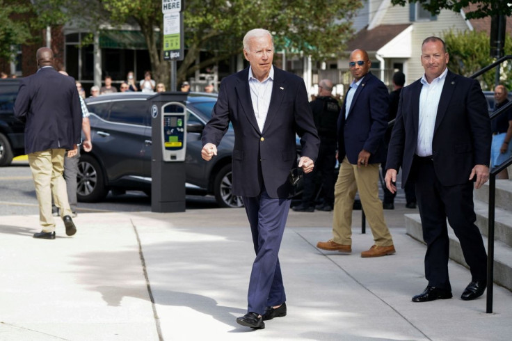 U.S. President Joe Biden gestures in response to a reporter question about his bike fall earlier in the day as he leaves St. Edmond Roman Catholic Church after attending a mass in Rehoboth Beach, Delaware, U.S., June 18, 2022. 