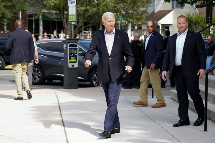 U.S. President Joe Biden gestures in response to a reporter question about his bike fall earlier in the day as he leaves St. Edmond Roman Catholic Church after attending a mass in Rehoboth Beach, Delaware, U.S., June 18, 2022.