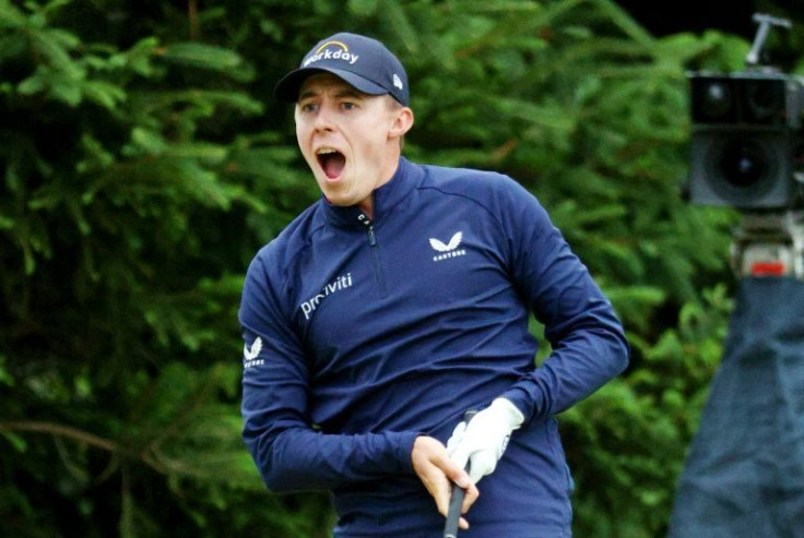 England's Matt Fitzpatrick reacts to an errant tee shot at the 18th hole on his way to sharing the lead with American Will Zalatoris after Saturday's third round of the US Open