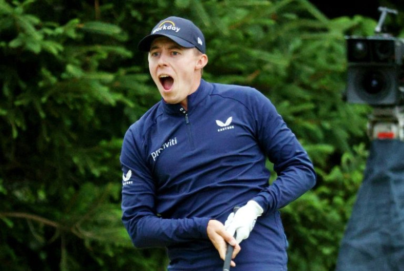 England's Matt Fitzpatrick reacts to an errant tee shot at the 18th hole on his way to sharing the lead with American Will Zalatoris after Saturday's third round of the US Open