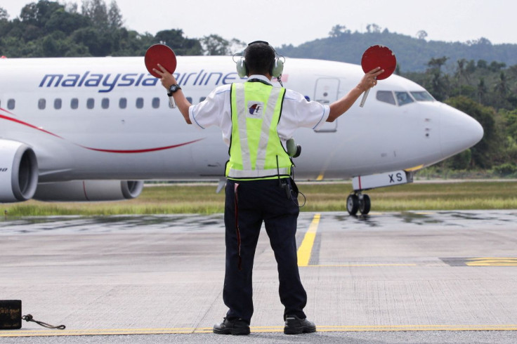 A Malaysia Airlines plane carrying the first batch of tourists arrives at the airport as Langkawi reopens to domestic tourists, amid the coronavirus disease (COVID-19) pandemic, in Malaysia September 16, 2021.