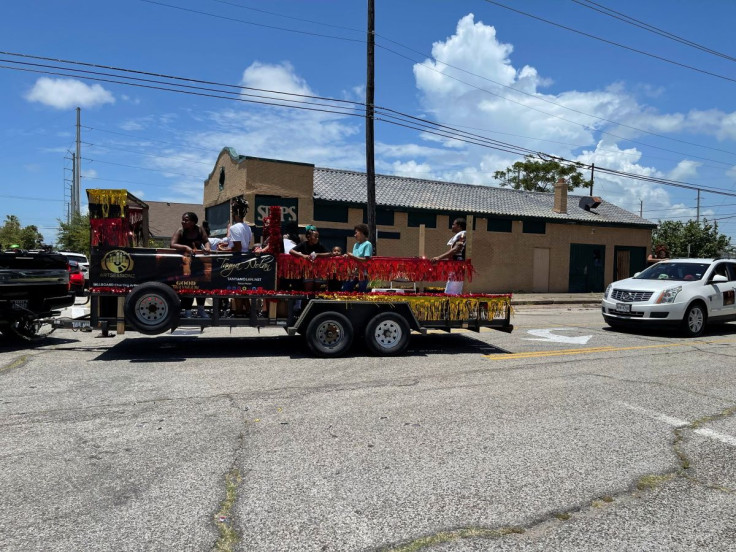 Vehicles pass during the Juneteenth parade in Galveston, Texas, U.S., June 18, 2022. 