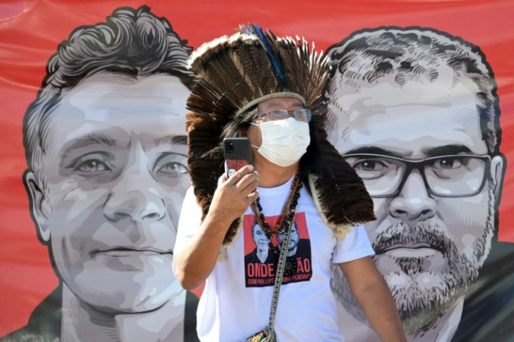An indigenous man takes part in a protest outside the Ministry of Justice in Brasilia, during the search for missing British journalist Dom Phillips and Brazilian Indigenous affairs specialist Bruno Pereira on June 14, 2022