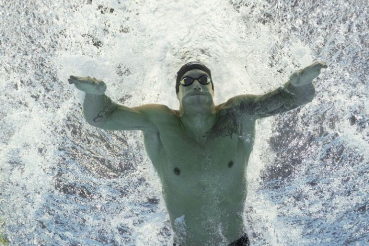 Caeleb Dressel powering to gold in the men's butterfly sprint