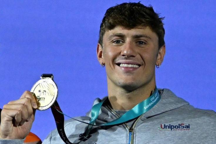 Grabbing the gold:  Nicolo Martinenghi shows off his 100m breaststroke medal