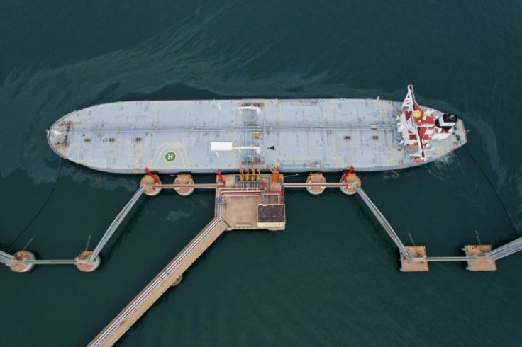 An oil tanker unloads imported crude oil at Qingdao port in China's eastern Shandong province on May 9, 2022.