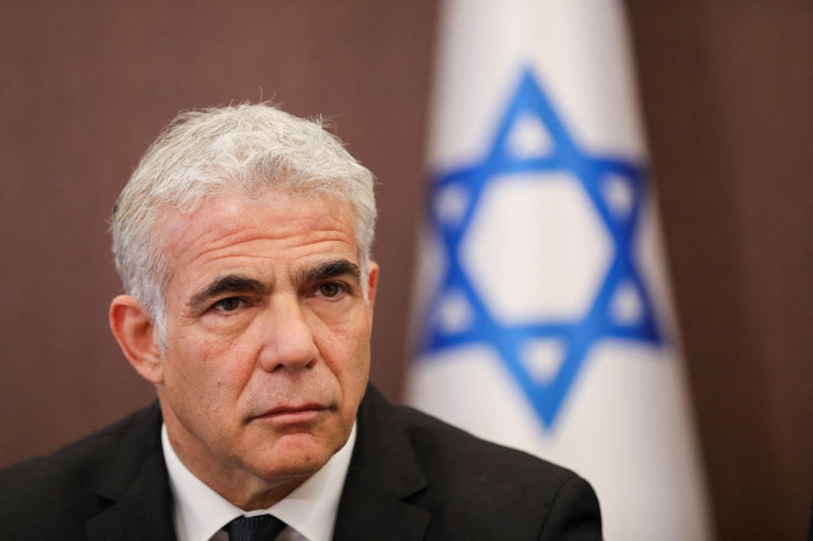 Israeli Foreign Minister Yair Lapid attends a cabinet meeting at the Prime Minister's office in Jerusalem May 15, 2022. Abir Sultan/Pool via