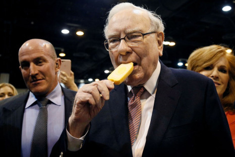 Berkshire Hathaway CEO Warren Buffett enjoys an ice cream treat from Dairy Queen before the Berkshire Hathaway annual meeting in Omaha, Nebraska, U.S. May 6, 2017. 
