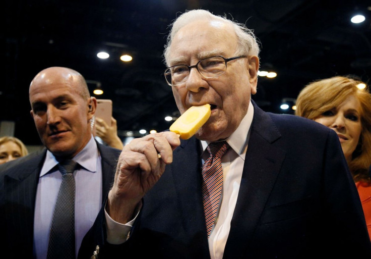 Berkshire Hathaway CEO Warren Buffett enjoys an ice cream treat from Dairy Queen before the Berkshire Hathaway annual meeting in Omaha, Nebraska, U.S. May 6, 2017. 