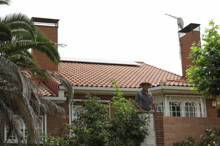 Juan Manuel Cosmes stands at his home, which is powered by Huawei solar panel installation, in Rivas, Spain, June 15, 2022. Picture taken June 15, 2022. 