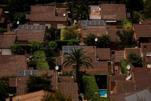 Solar panels are seen on the roofs of homes at the well-to-do suburb of Rivas-Vaciamadrid, south of Madrid, Spain, June 6, 2022. 
