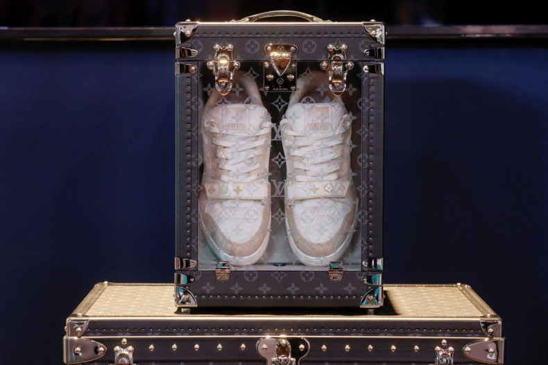 A pair of Louis Vuitton brand sneakers is pictured in a travel box, at the Viva Technology conference dedicated to innovation and startups, at Porte de Versailles exhibition center in Paris, France June 16, 2022. 