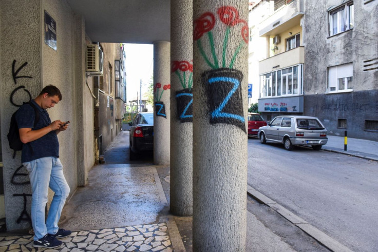 A person stands next to a letter Z, which has become a symbol of the Russian military, following Russia's invasion of Ukraine, in Belgrade, Serbia, June 20, 2022.