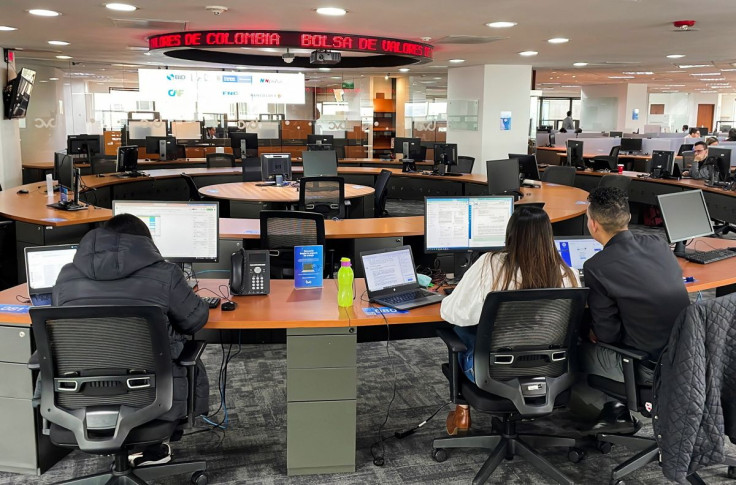 Traders work on the floor of the Colombian Stock Exchange, in Bogota, Colombia, June 21, 2022.
