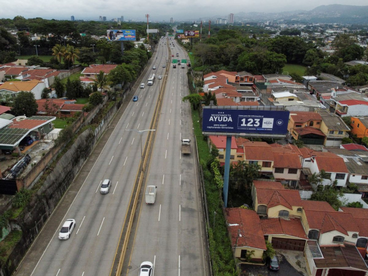 A general view of a government poster that reads, âWe need your help to keep capturing terrorists", after El Salvador's Congress extended emergency powers to fight gangs for one more month, in Soyapango, El Salvador June 21, 2022. Picture taken with a d