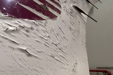 Surface damage seen on Qatar Airways' airbus A350 parked at Qatar airways aircraft maintenance hangar in Doha, Qatar, June 20, 2022.  