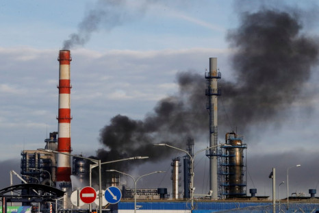 Smoke billows from a fire at oil refinery, owned by Russian oil producer Gazprom Neft, in Moscow, Russia, November 17, 2018.  
