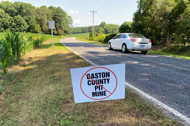 A sign planted by opponents of the Piedmont Lithium's planned mine is seen on a roadside in Gaston County, North Carolina, U.S., July 15, 2021.