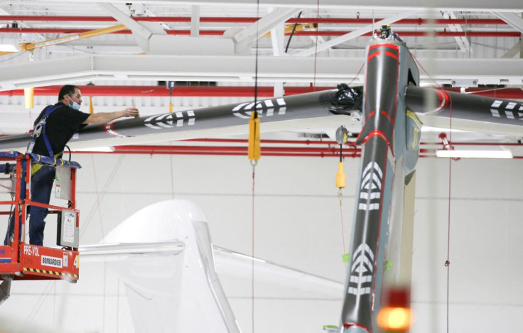 A Bombardier employee works on interior completions and exterior touch-ups for delivery preparation of the Global aircraft at Bombardier's Laurent Beaudoin Completion Centre in Montreal, Quebec, Canada March 29, 2022.