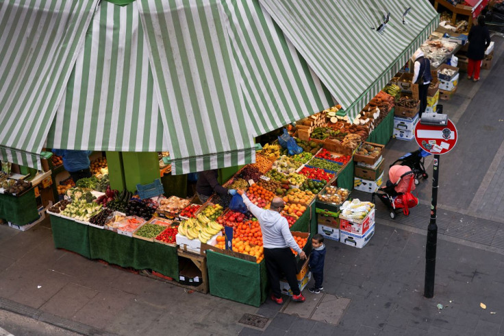 A man shops for fruit and vegetables at Brixton Market, amid the spread of the coronavirus disease (COVID-19) in London, Britain, September 27, 2020. 