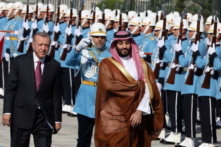 Turkish President Tayyip Erdogan and Saudi Crown Prince Mohammed bin Salman review a guard of honour during a welcome ceremony at the Presidential Palace in Ankara, Turkey, June 22, 2022. 