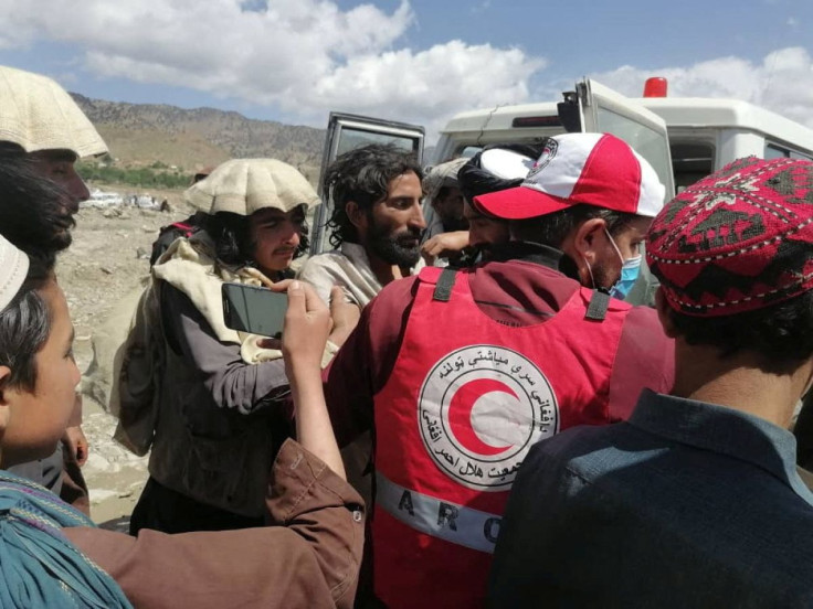 Afghan Red Crescent medics and volunteers transport earthquake victims to hospitals in Spera district, Khost province, Afghanistan, June 22, 2022. Afghan Red Crescent Society/Handout via REUTERS