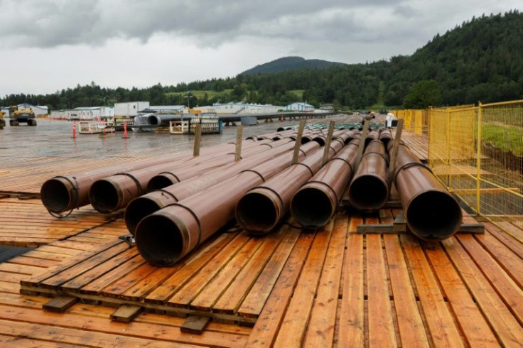 The Trans Mountain pipeline, whose pieces are seen here at a storage lot in Abbotsford, Canada in June 2021 waiting to be assembled, is no longer profitable, the office of the Parliamentary Budget Officer concluded in a report