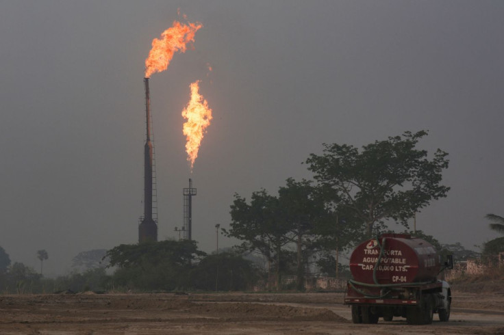 Gas is flared at the state energy company Petroleos Mexicanos (Pemex) Perdiz Plant, which is unable to process the vast volumes of gas sent from the Ixachi field, outside of Tierra Blanca, Mexico May 4, 2022. Picture taken May 4, 2022.