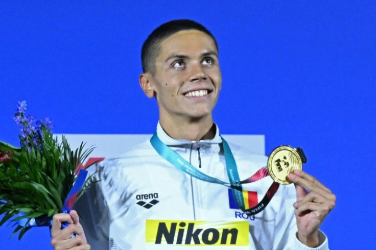 David Popovici shows off his second 'pretty heavy' gold medal