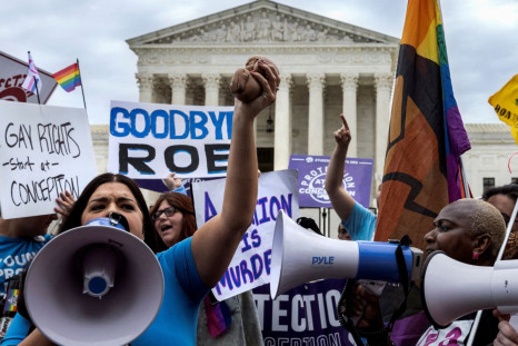 Abortion rights supporters and anti-abortion demonstrators protest outside the United States Supreme Court in Washington, U.S., June 21, 2022. 