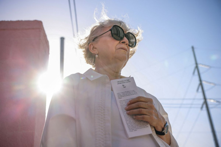 Beverly McMillan, a former Mississippi abortion provider who now opposes the procedure, prays outside the Jackson Women's Health Organization, in Jackson, Mississippi, U.S., May 21, 2021. Picture taken May 21, 2021. 