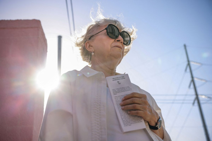 Beverly McMillan, a former Mississippi abortion provider who now opposes the procedure, prays outside the Jackson Women's Health Organization, in Jackson, Mississippi, U.S., May 21, 2021. Picture taken May 21, 2021.