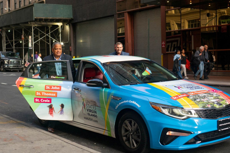 A rideshare car with ads wrapped by mobile advertisement company Carvertise is seen at the Sports Illustrated Swimsuit Event in New York City, U.S., in this file image acquired by Reuters on June 22, 2022. Carvertise/Handout via REUTERS   