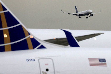 A United Airlines passenger jet lands at Newark Liberty International Airport, New Jersey, U.S. December 6, 2019. 