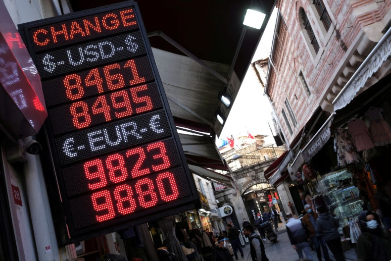 A board shows the currency exchange rates outside an exchange office in Istanbul, Turkey November 4, 2020. 