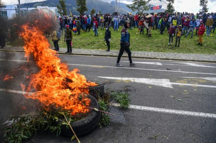 Ecuadorean police fired tear gas at protesters who threw rocks and fireworks in return as violence broke out on the 11th day of mass anti-government demonstrations led by the Indigenous community