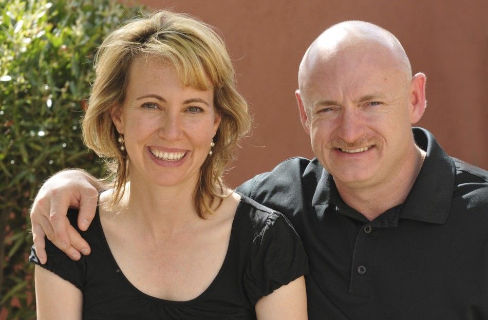 File handout image of U.S. Representative Gabrielle Giffords is seen with her husband Mark Kelly in an undated handout photo