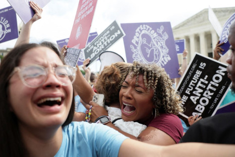 Anti-abortion demonstrators celebrate outside the United States Supreme Court as the court rules in the Dobbs v Womenâs Health Organization abortion case, overturning the landmark Roe v Wade abortion decision in Washington, U.S., June 24, 2022. 